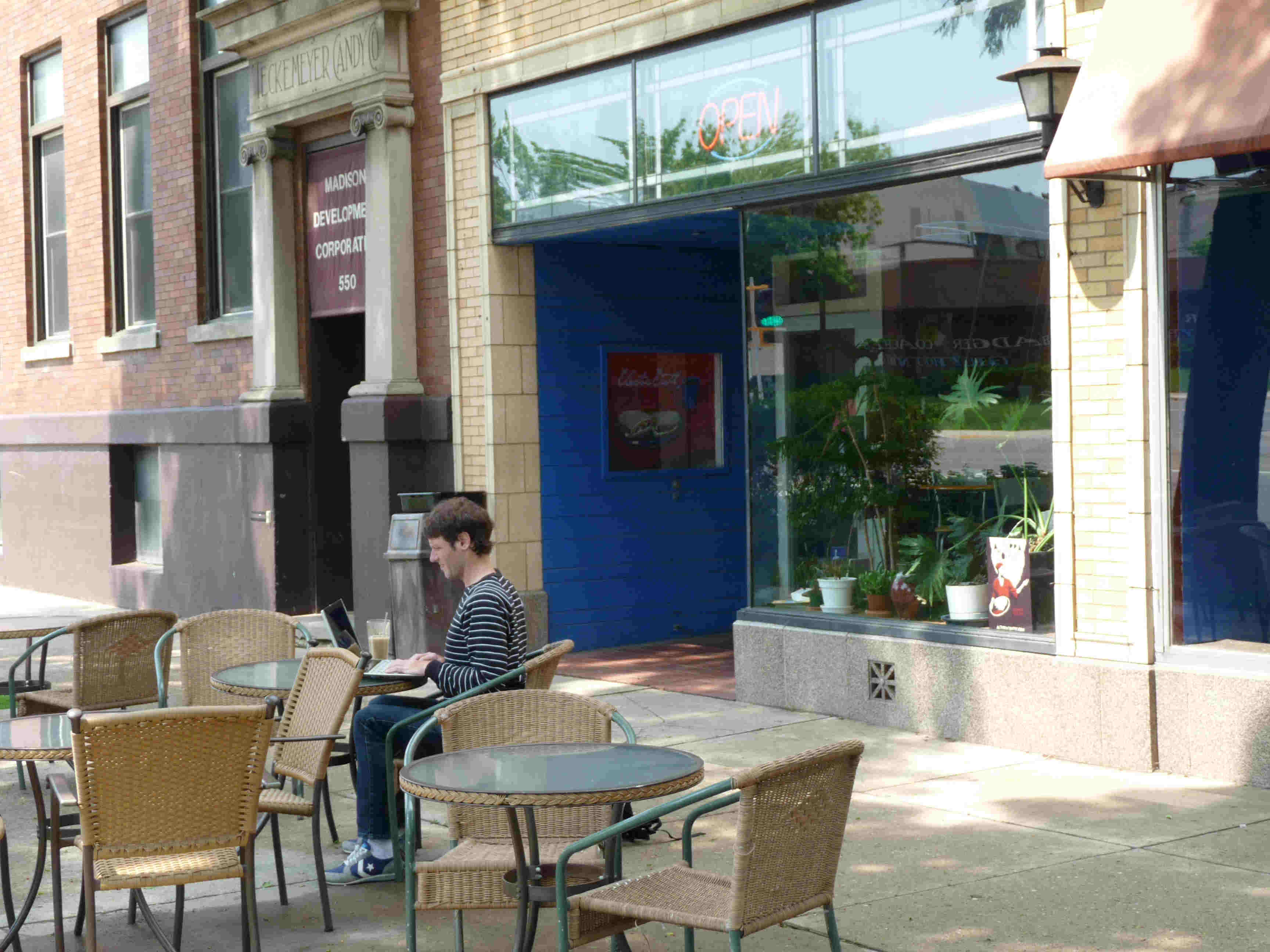 Outside seating along W. Washington for Electric Earth Cafe.